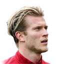 L. KARIUS
